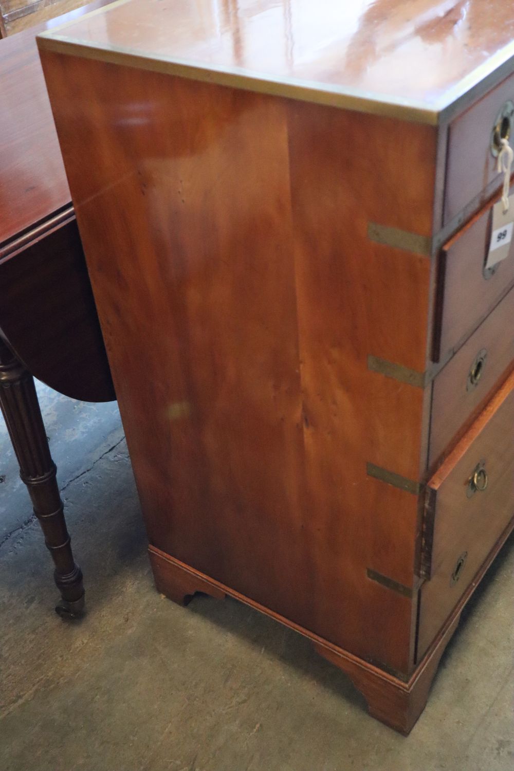 A brass mounted yew wood campaign style chest of three short and four graduated long drawers, width 77cm height 90cm and another simila